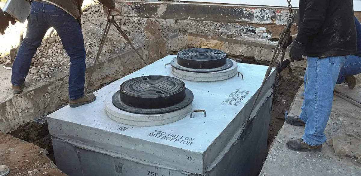 Grease trap installation for a commercial property drainage system in Madison, WI